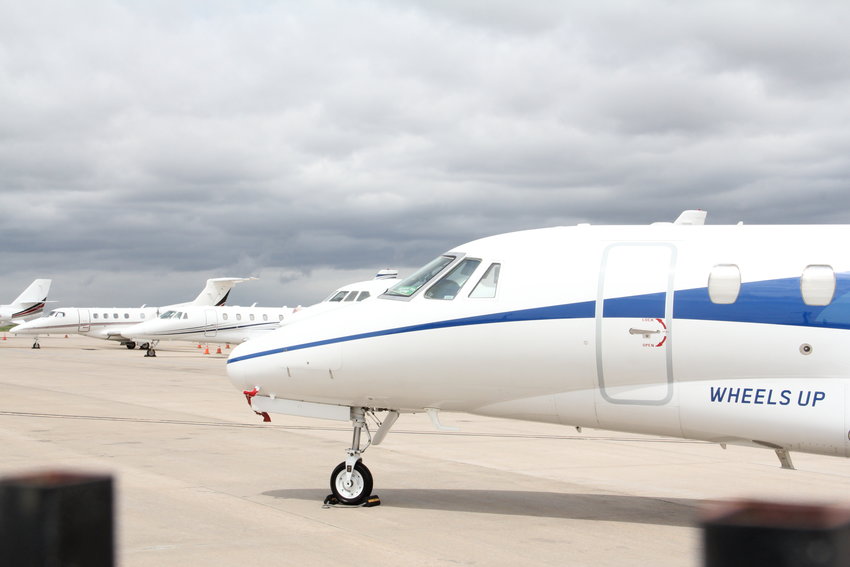 Planes stand at Centennial Airport on May 7. That airport is among those that may have flight paths re-routed by the Denver Metroplex plan by the Federal Aviation Administration.